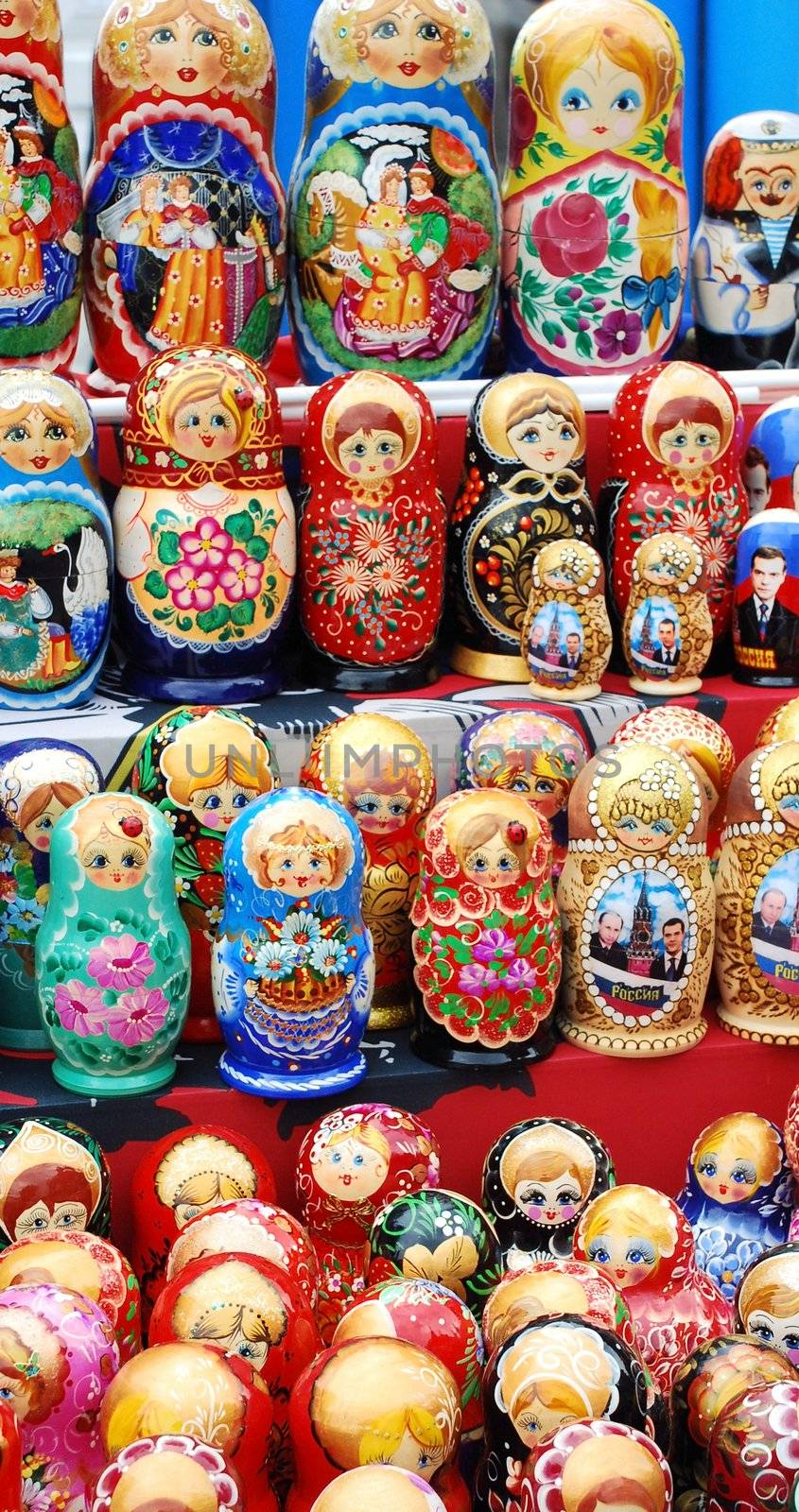 shop window with set of russian dolls of decreasing sizes by jordano