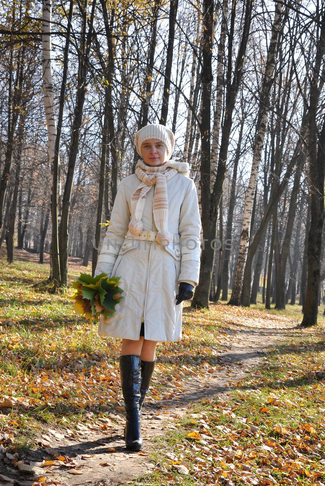 romantic girl in an autumn wood in october