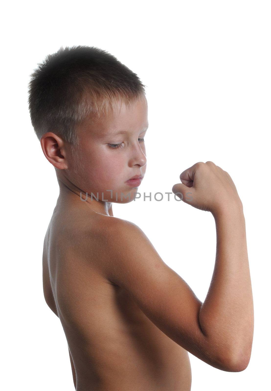 Preschool boy showing how muscu