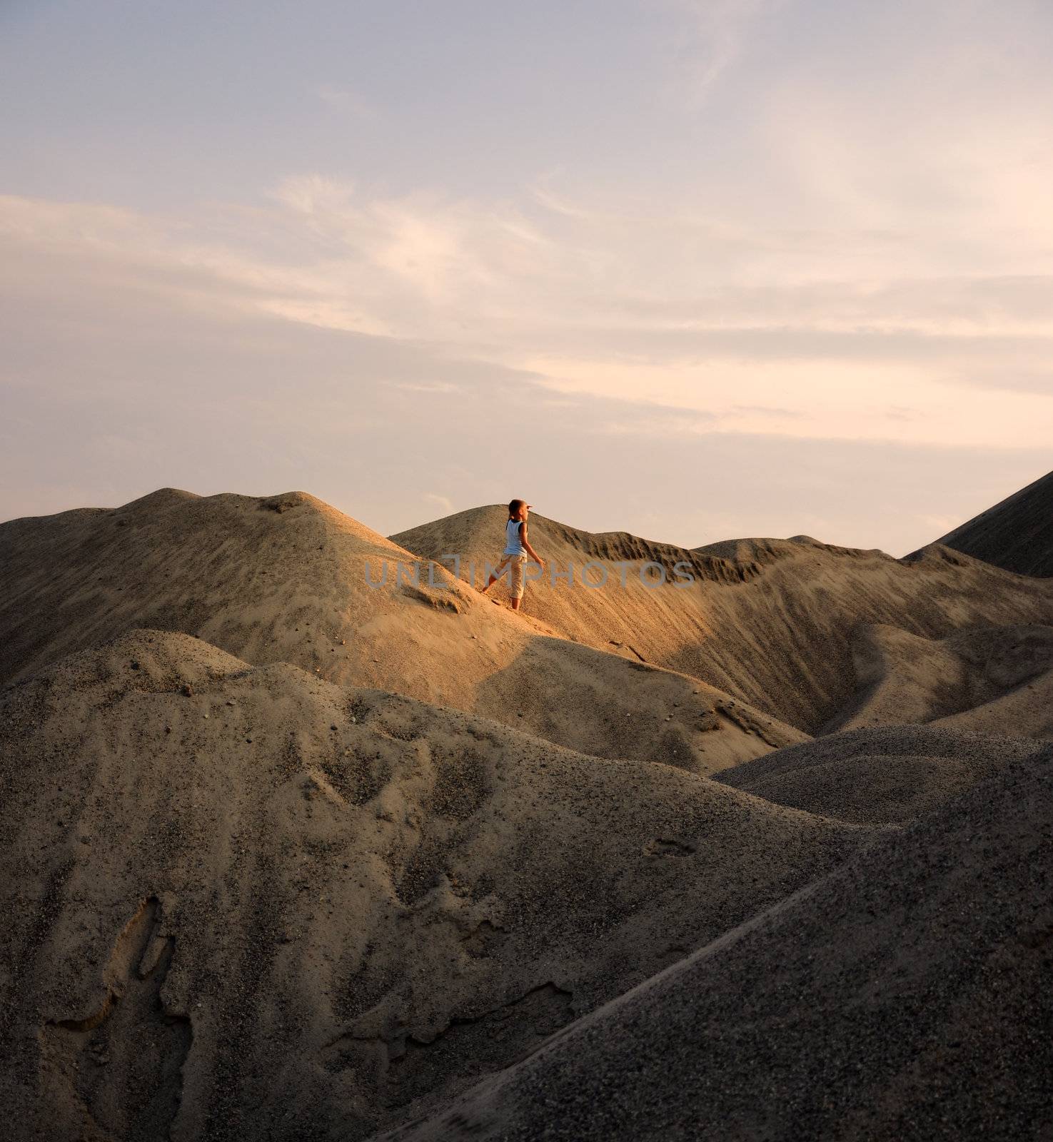 young man go up in sand by jordano