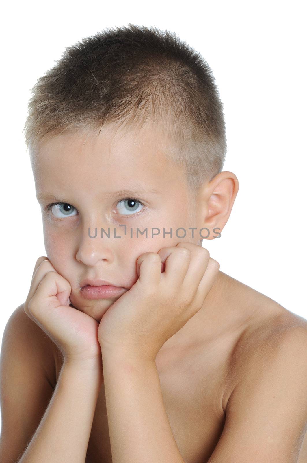 Portrait of a young boy with looking troubled