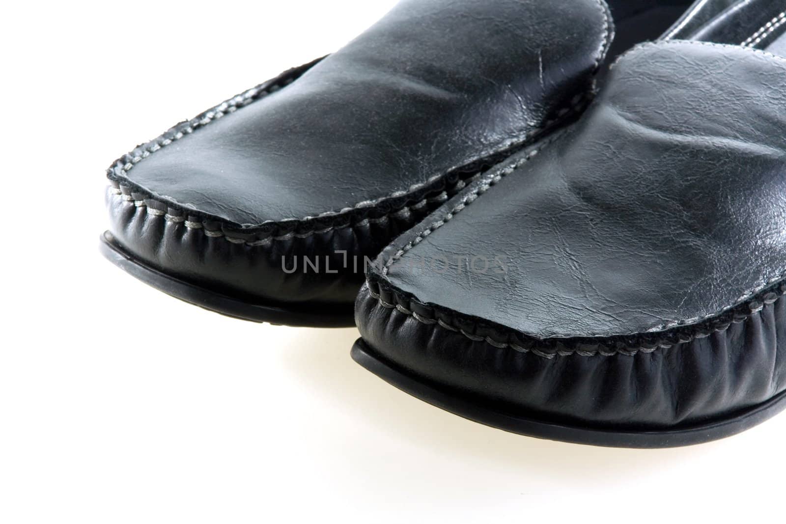 Black elegant fashionable male shoes on white background