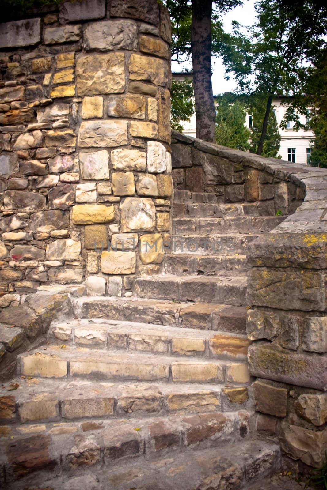 Beautiful twisted stone block staircase leading up into the unknown
