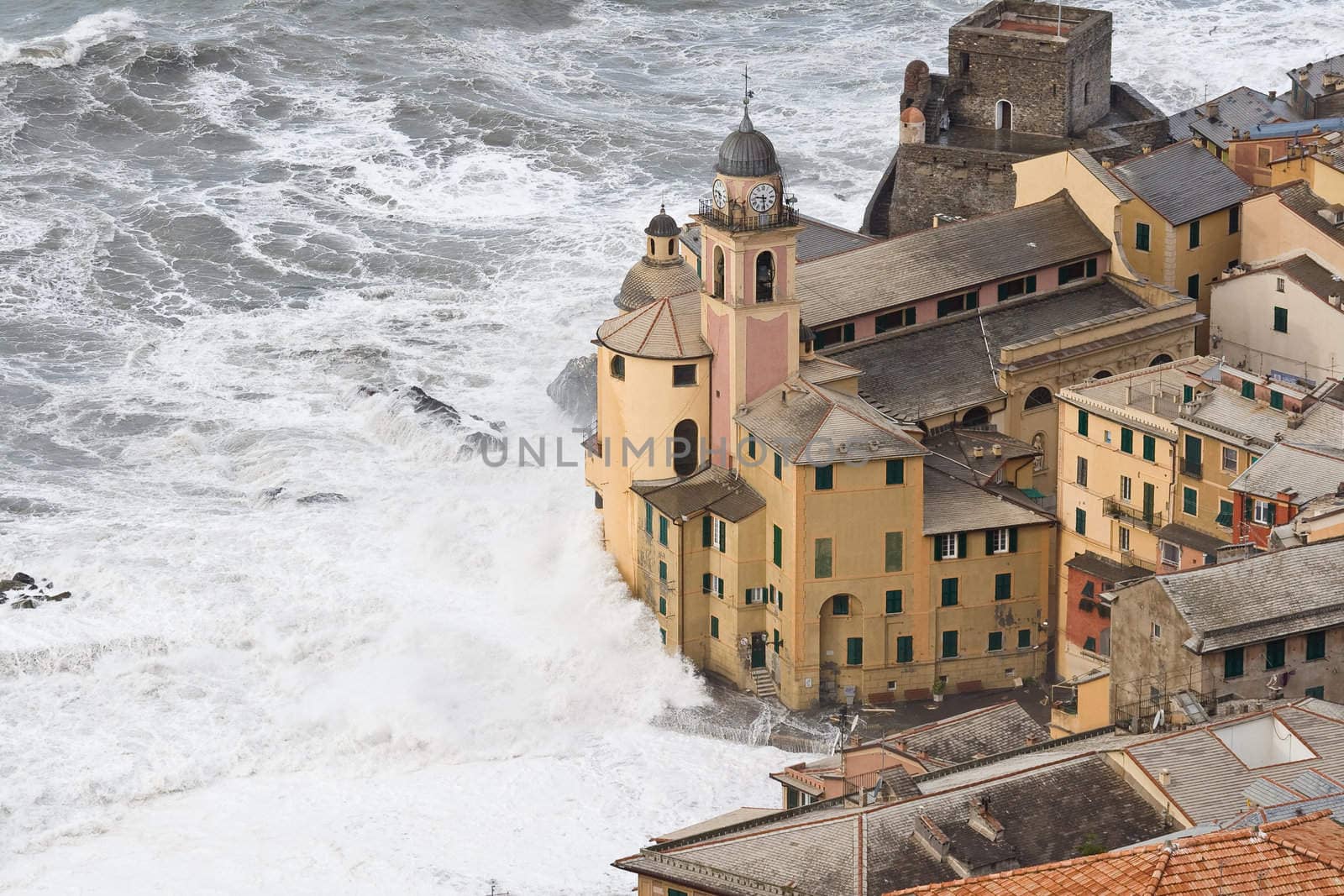 Sea storm in camogli, famous small town near Genova, italy