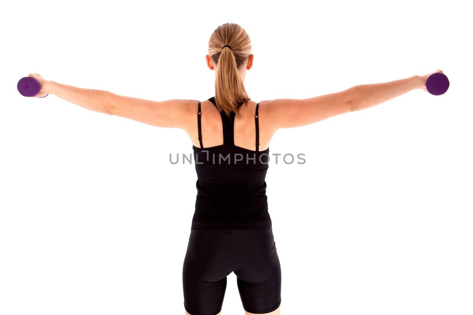 Lady doing dumbell exercises isolated