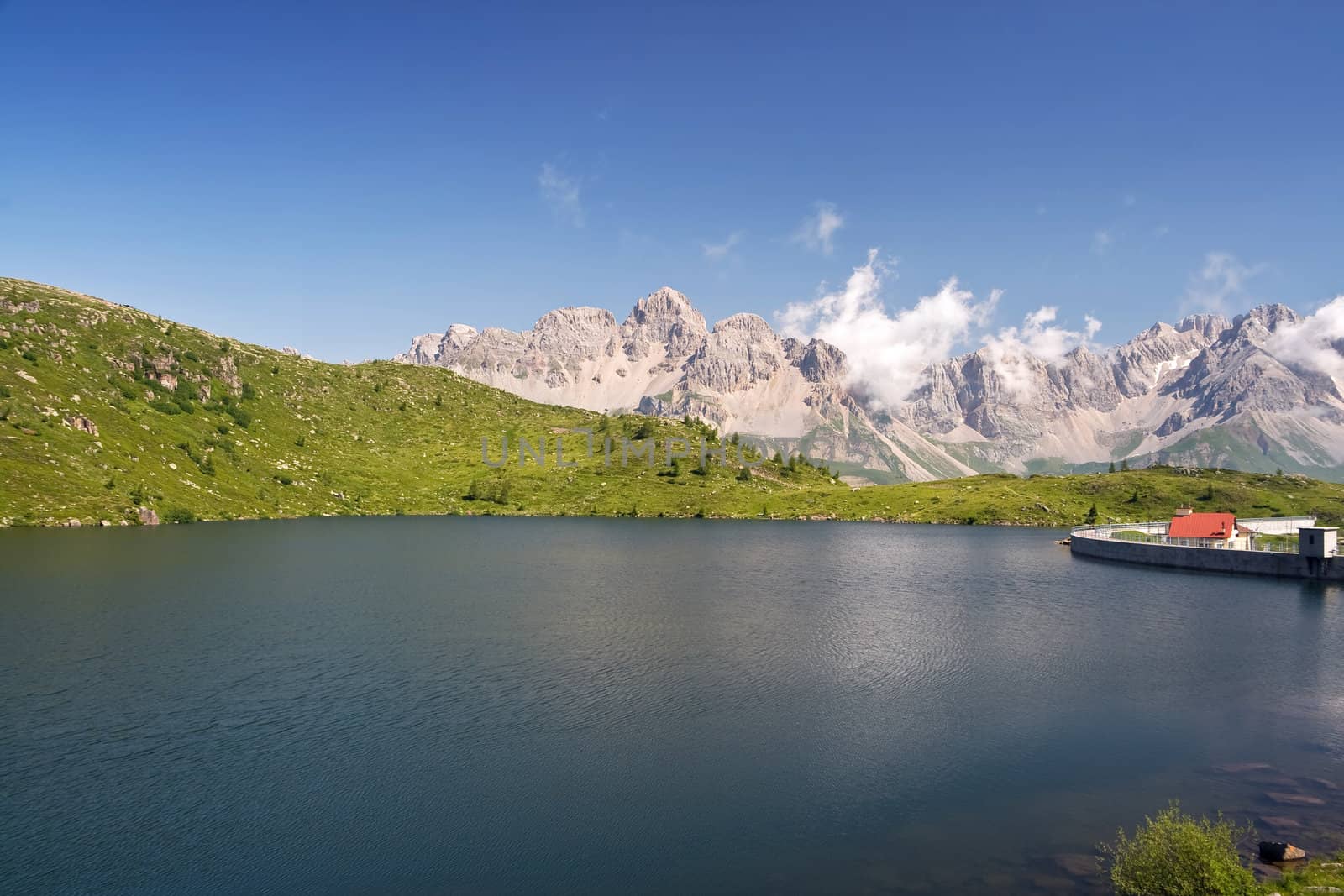summer view of lake Cavia near San Pellegrino pass, Trentino, Italy 