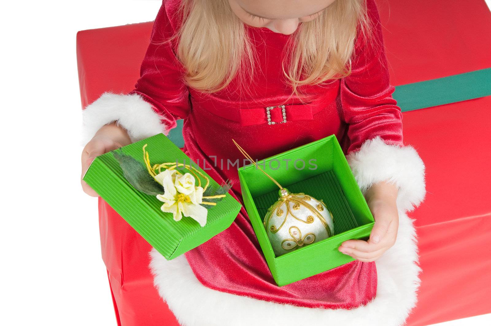 Christmas toddler with present boxes, studio shot