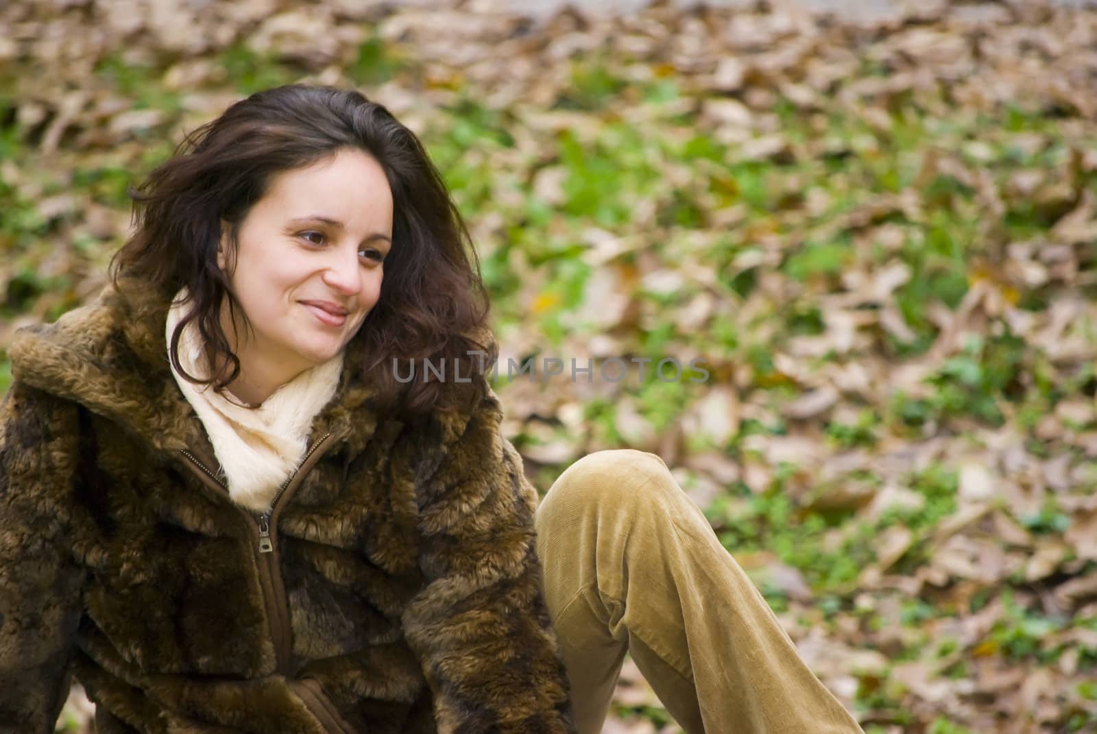 beautiful young woman outdoors portrait in autumn fashion