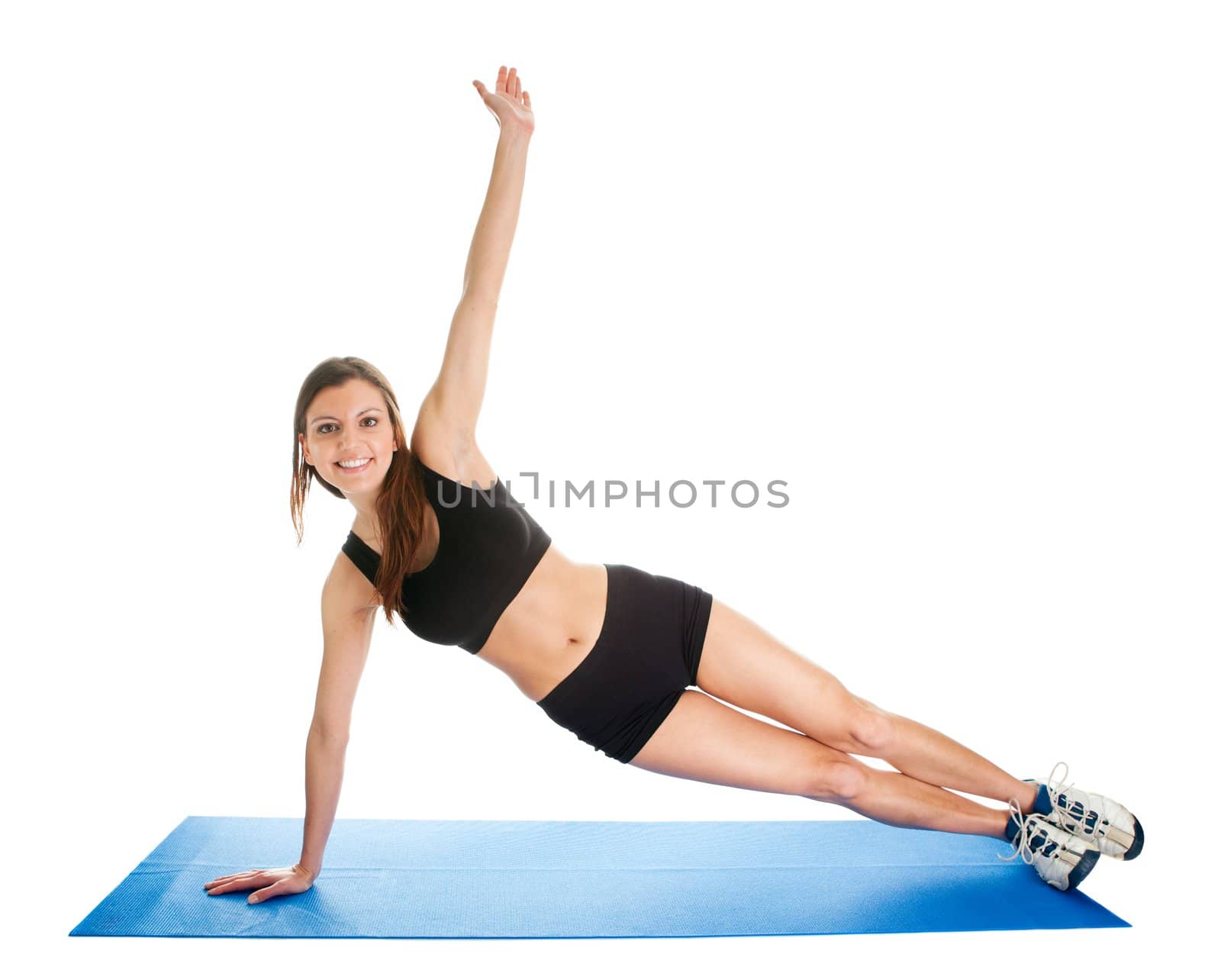 Fitness woman doing aerobics on gym mat. Isolated on white