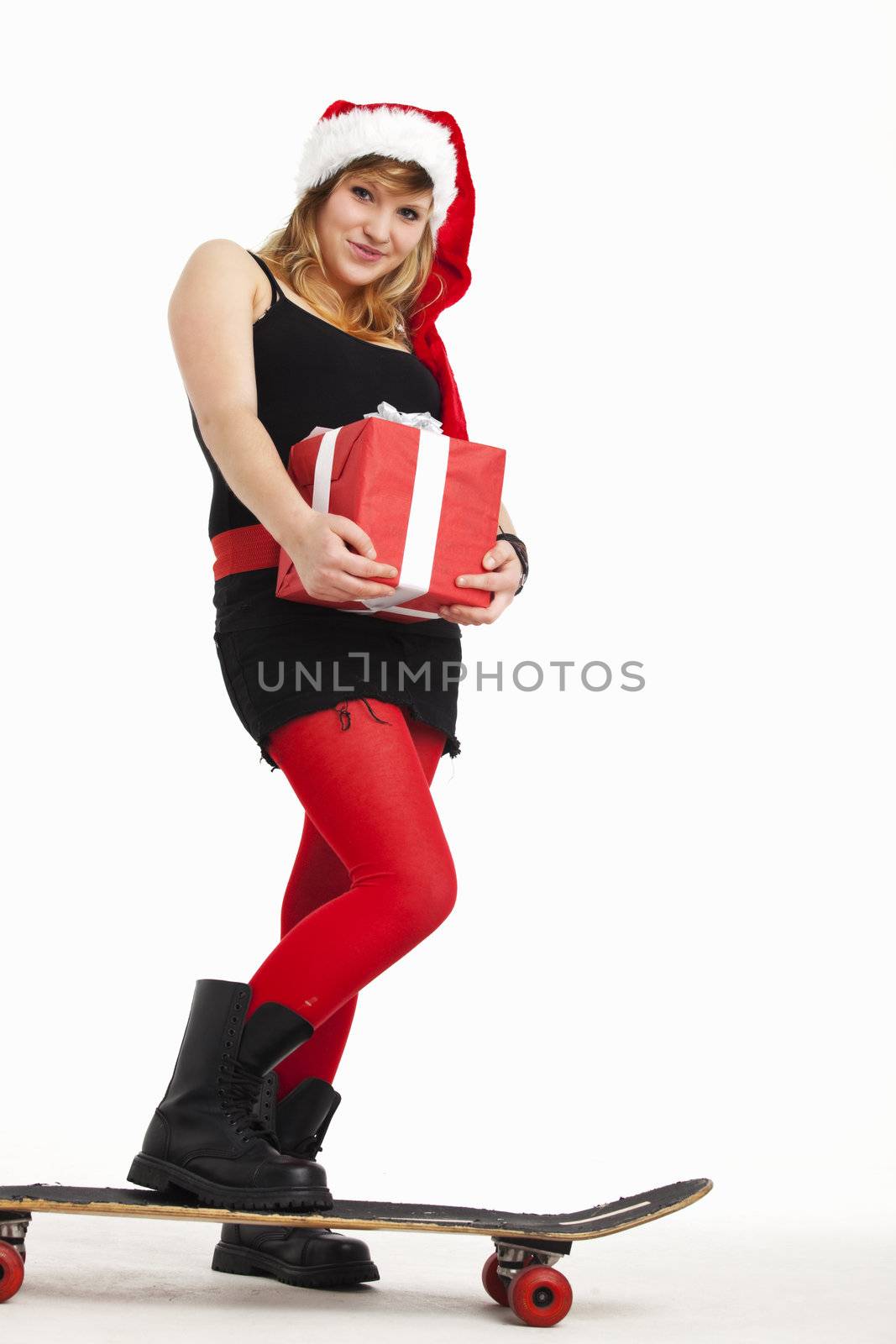 christmas punk girl with a skateboard