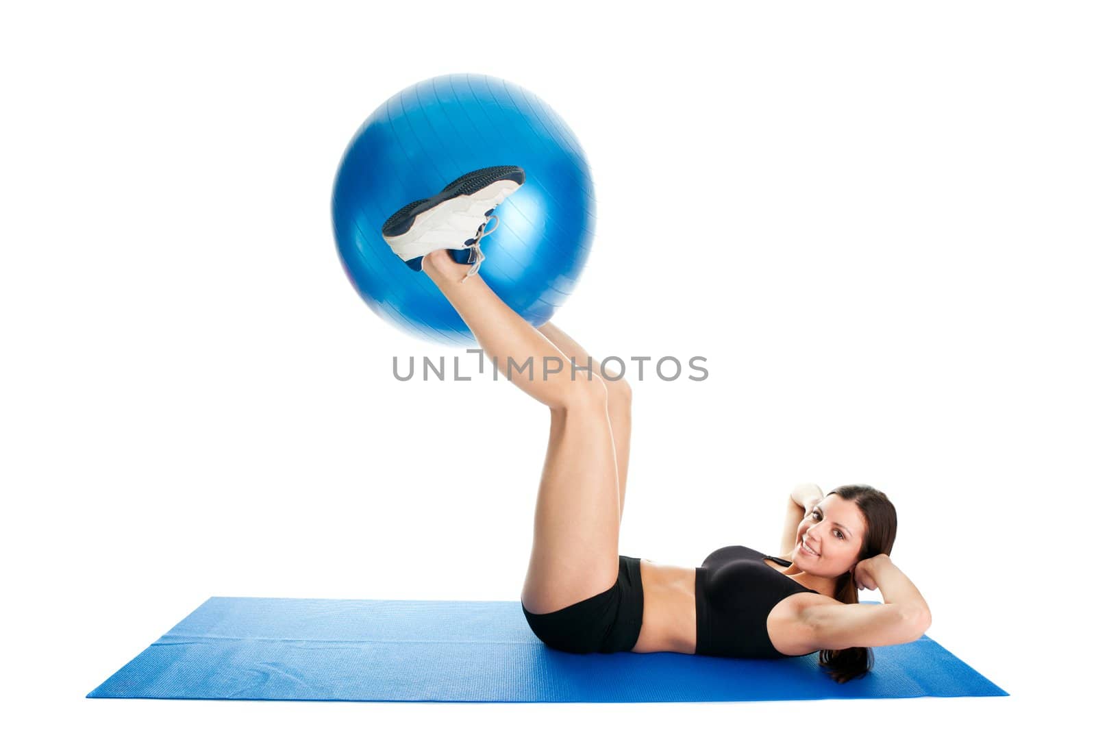 Fitness woman doing crunches on gym mat by AndreyPopov