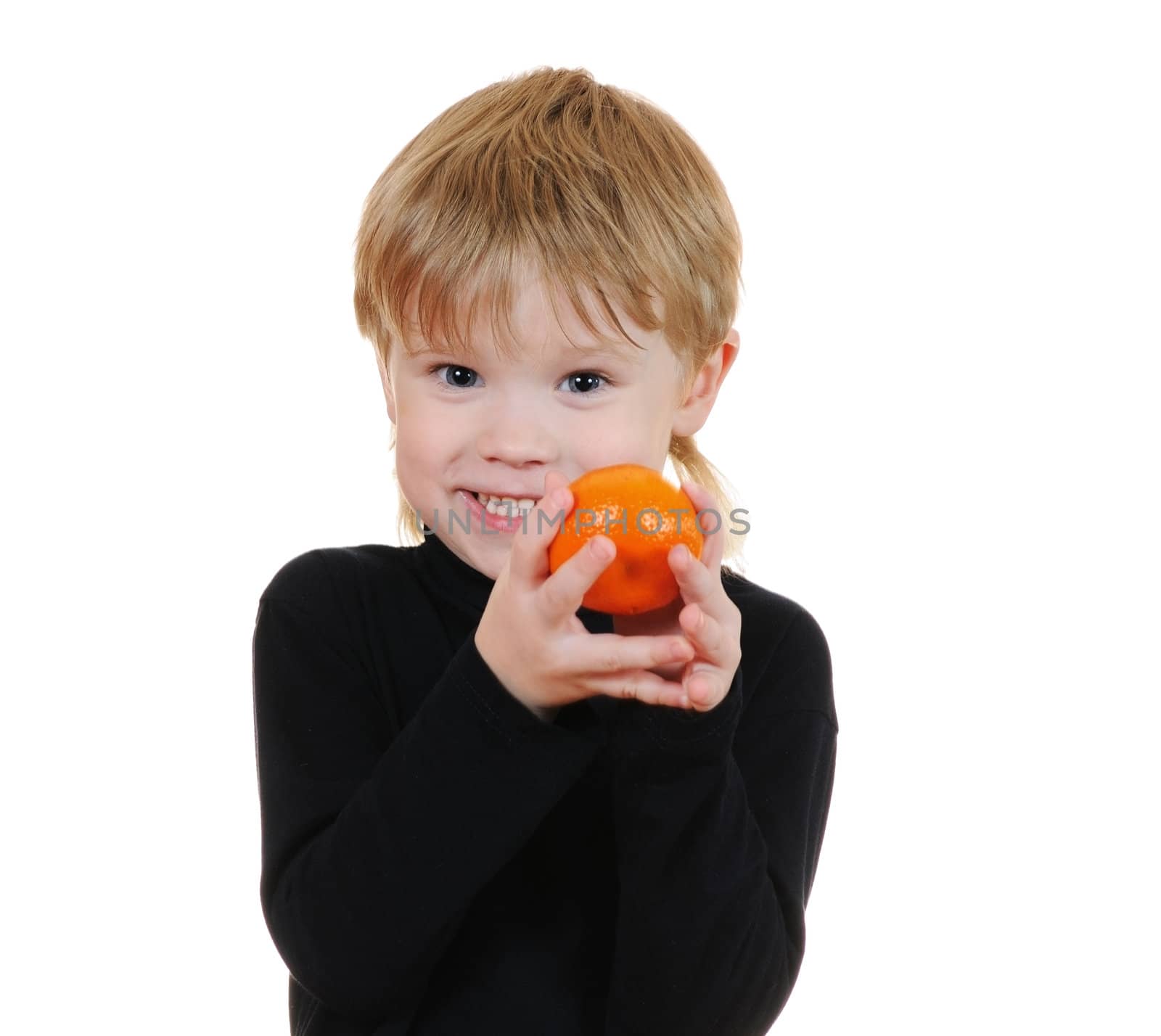 The cheerful child with orange isolated on white background