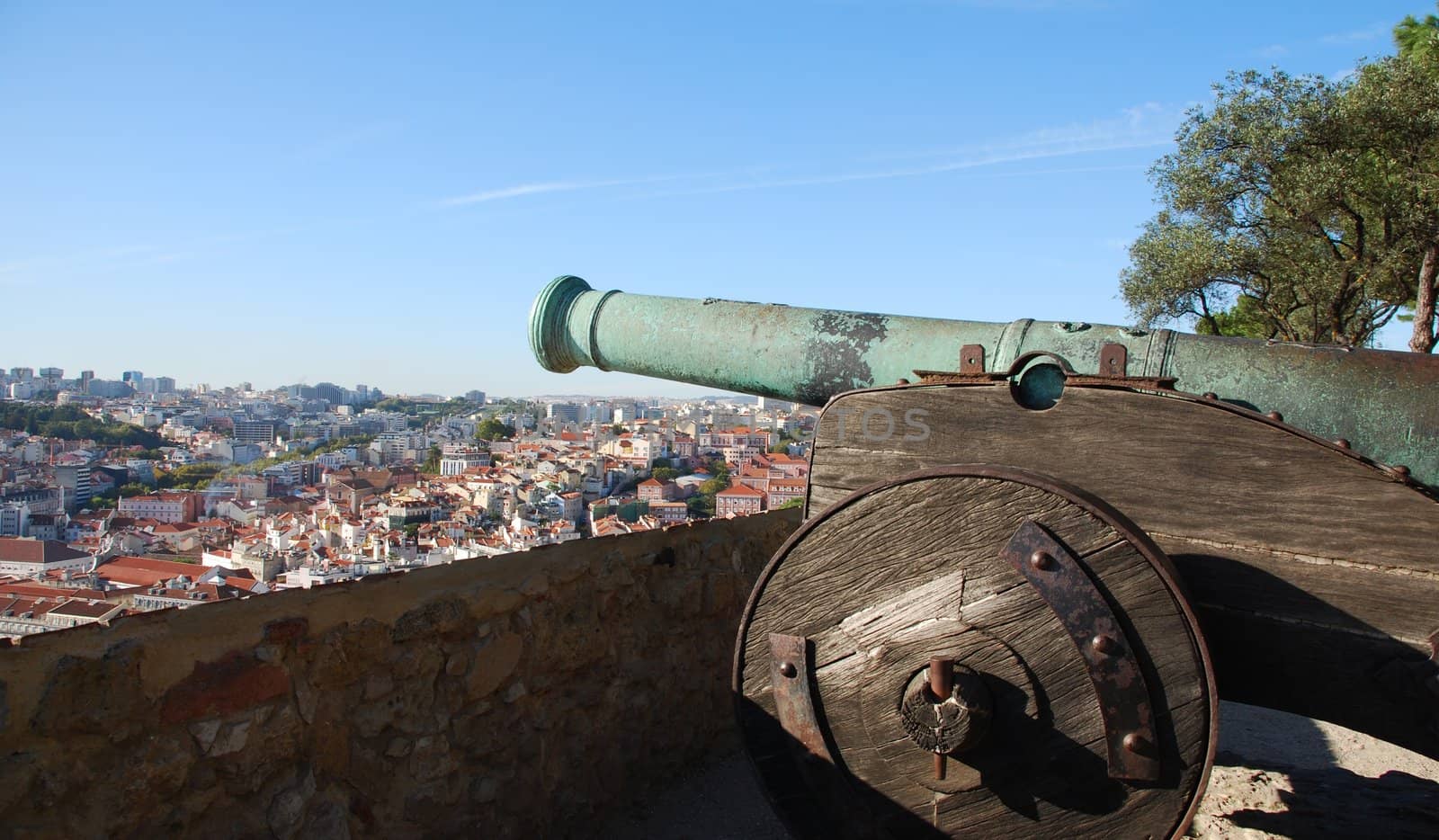 Cityscape of Lisbon in Portugal with cannon weapon by luissantos84