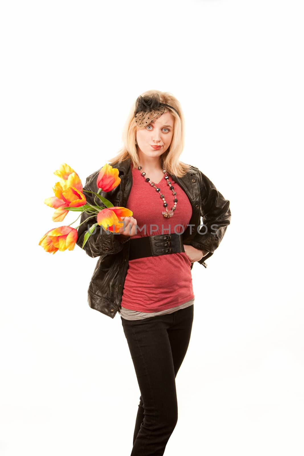 Pretty toung blonde woman with colorful plastic tulips