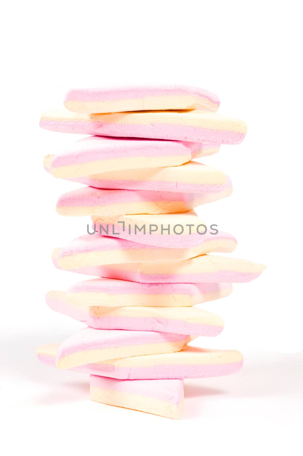 stack of pink and yellow marshmallow isolated on white