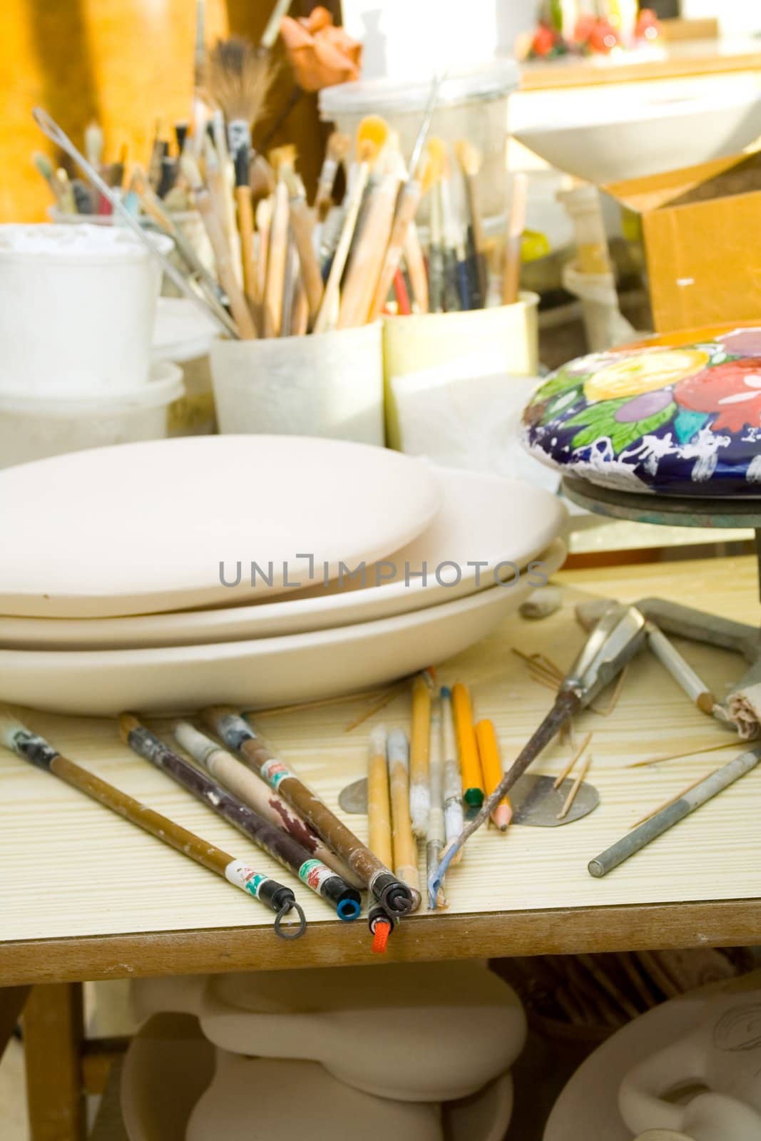 Workplace in the artist's studio. Brushes, tools and materials