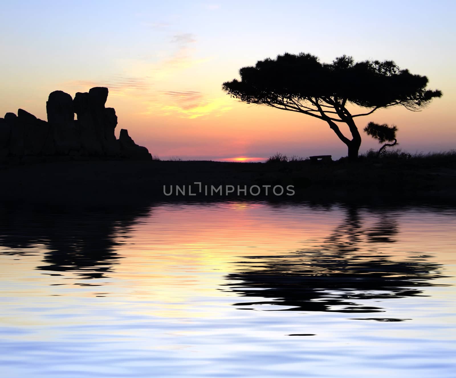 The oldest free-standing building/temple in the world. Oldest neolithic prehistoric temple built thousands of years before the pyramids. - Hagar Qim & Mnajdra Temples in Malta, Mediterranean Sea, Europe - here seen silhouetted at sunset