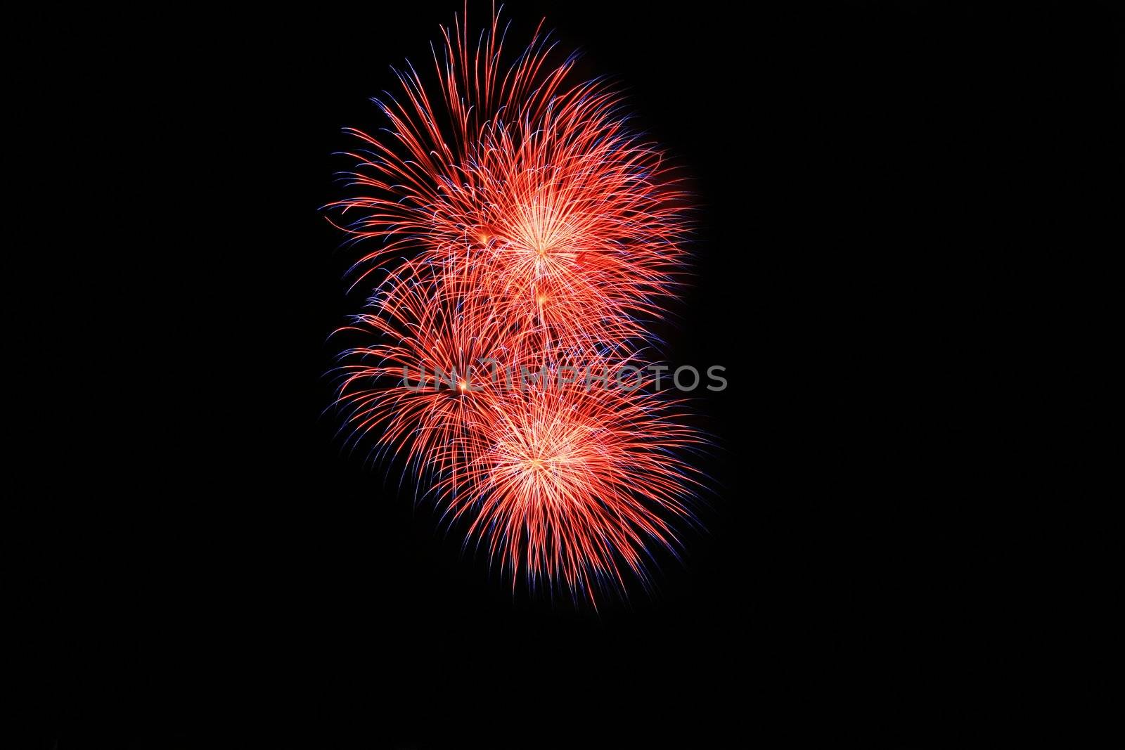 color changing fireworks against the dark sky

