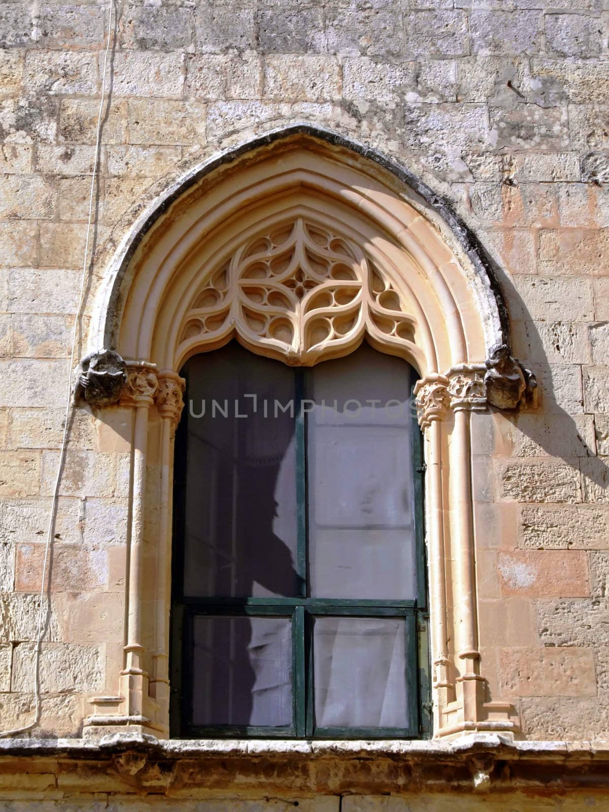 Medieval gothic window of house in the old city of Mdina, Malta