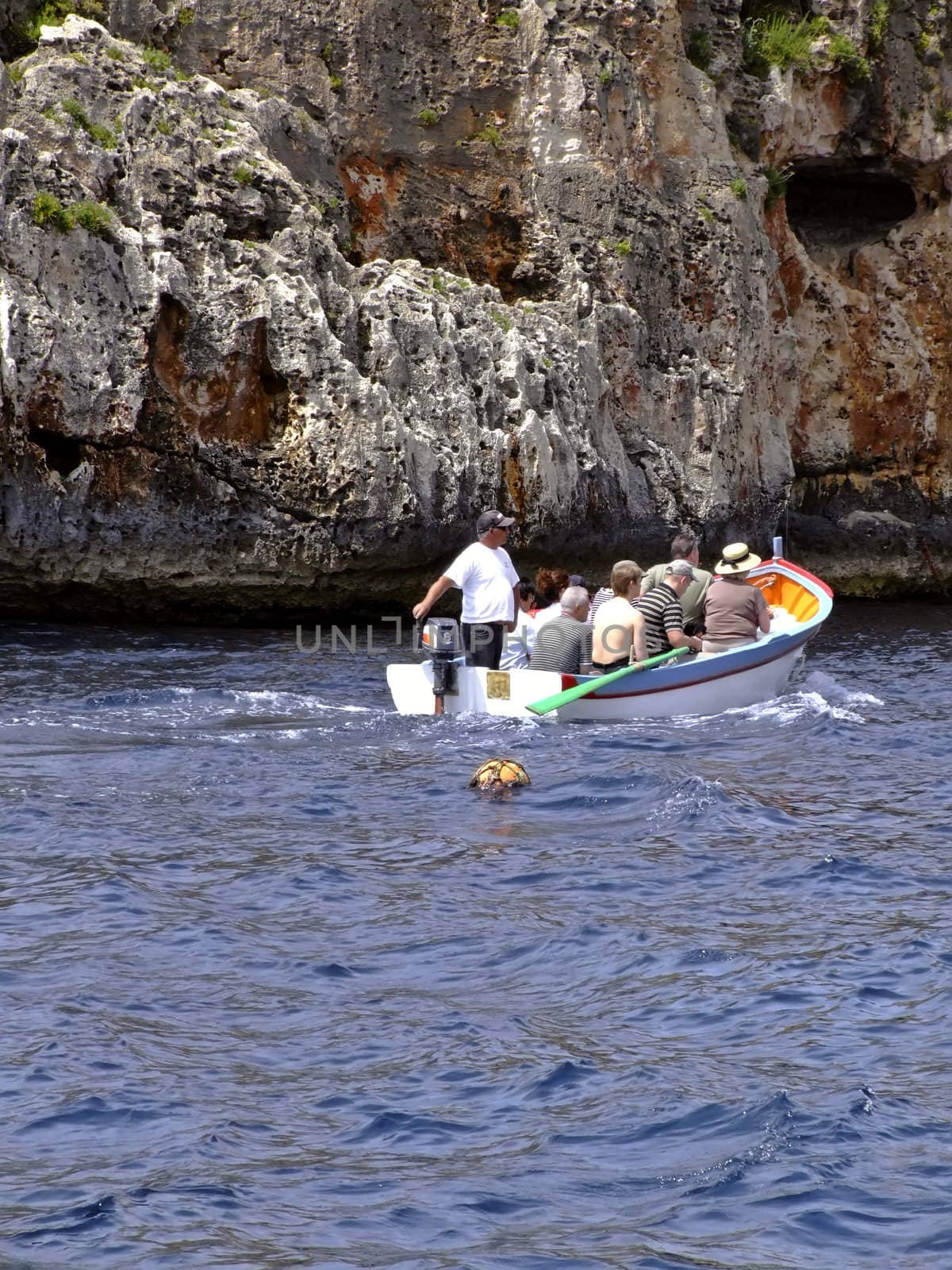 Group of tourists on leisure boat in Malta