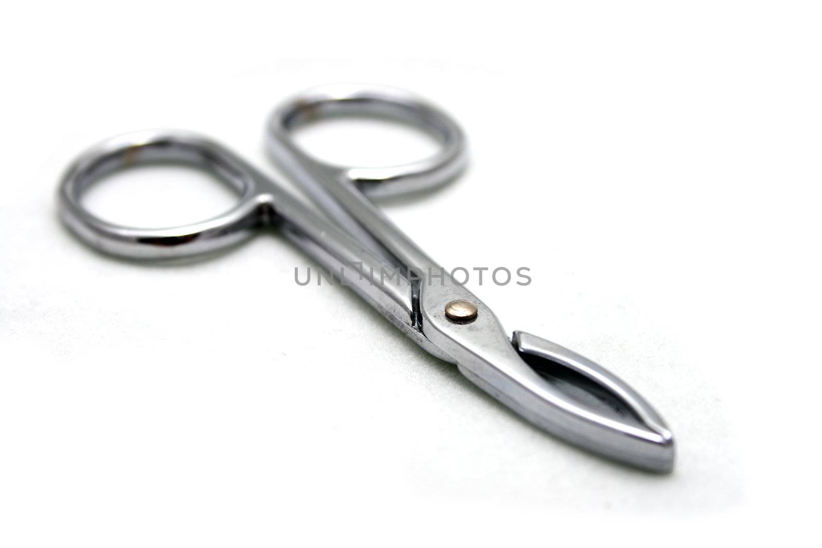 A hemostat on white background.