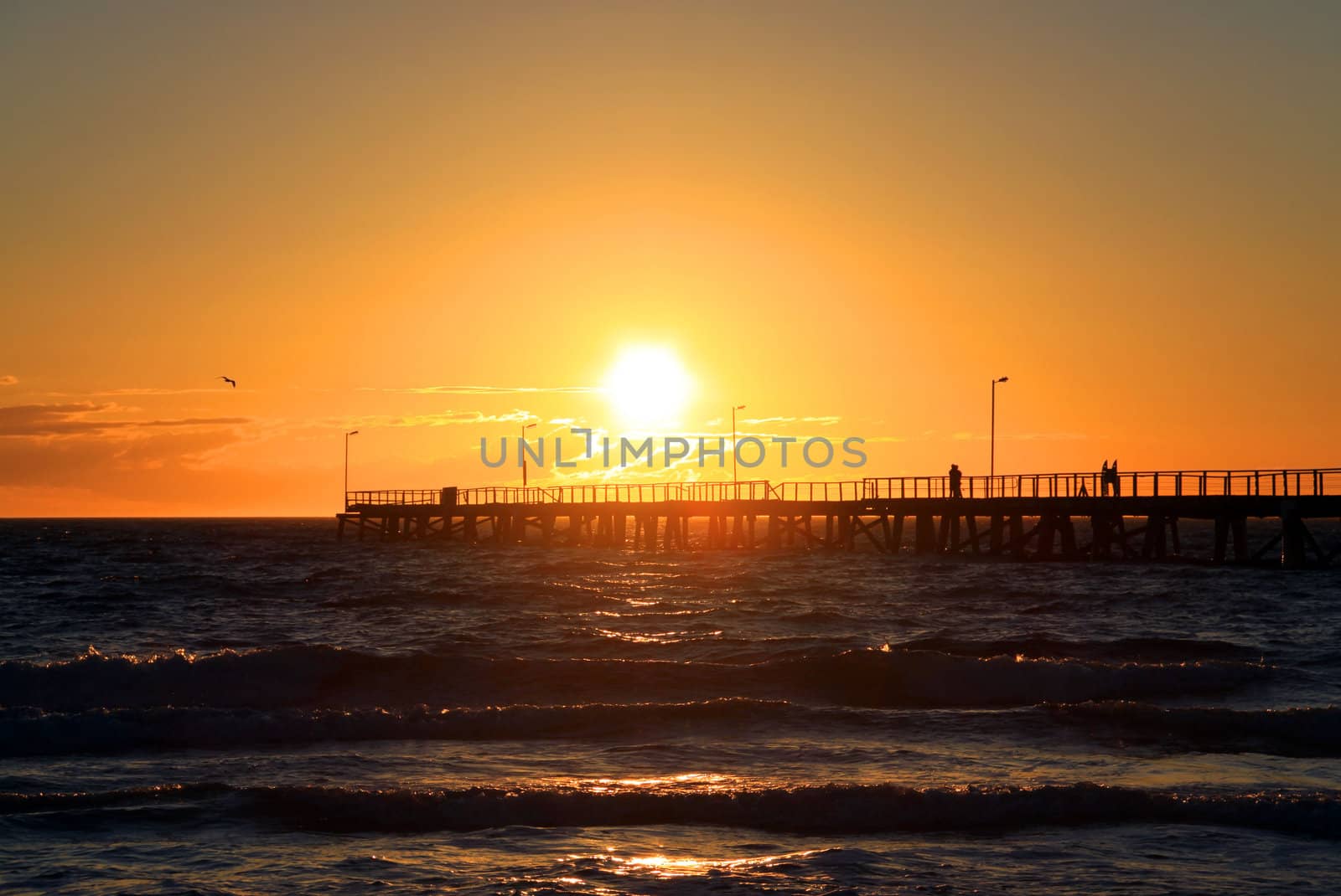 Sunset over Semaphore Jetty, Adelaide, Australia by Cloudia