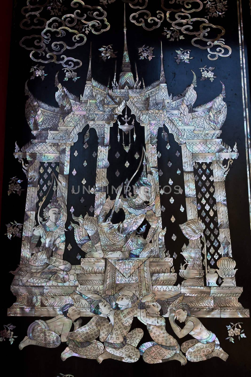 Traditional Thai style church door art, decorated with pieces oyster shell