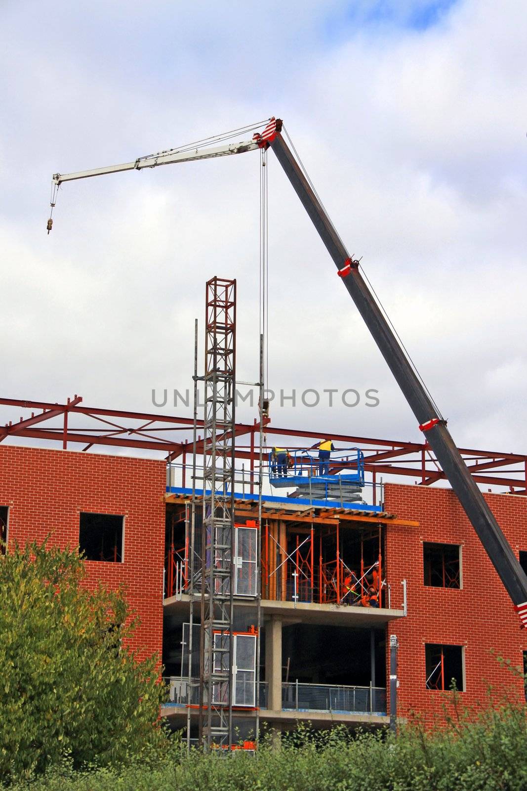 Construction site for Red Brick Office Building by Cloudia