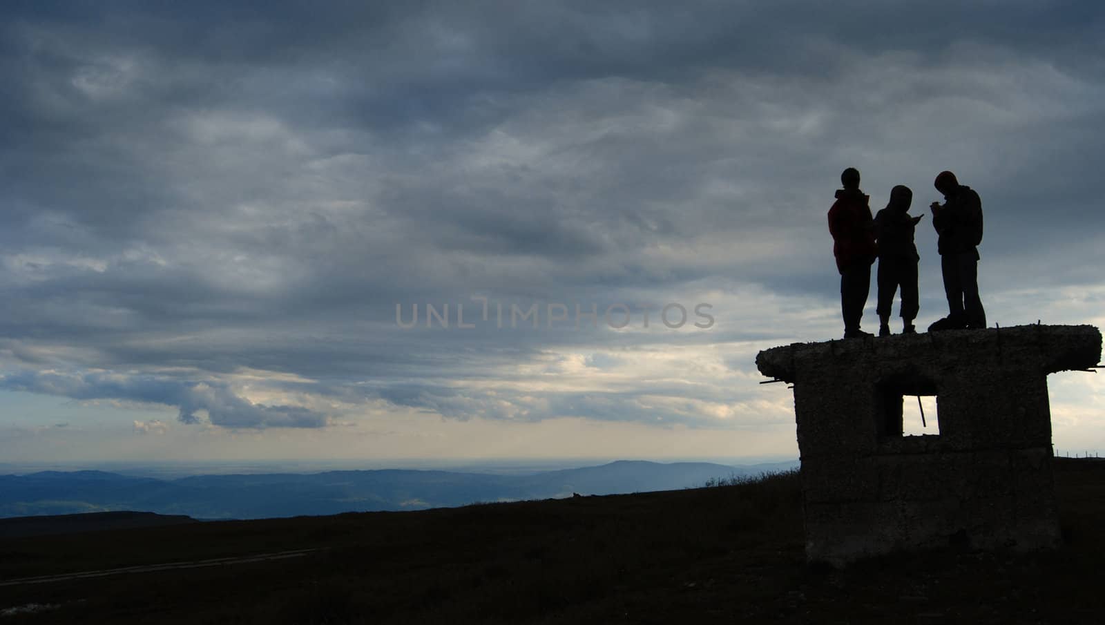 homeless teenagers spend time in abandoned ruins at the top of the hill