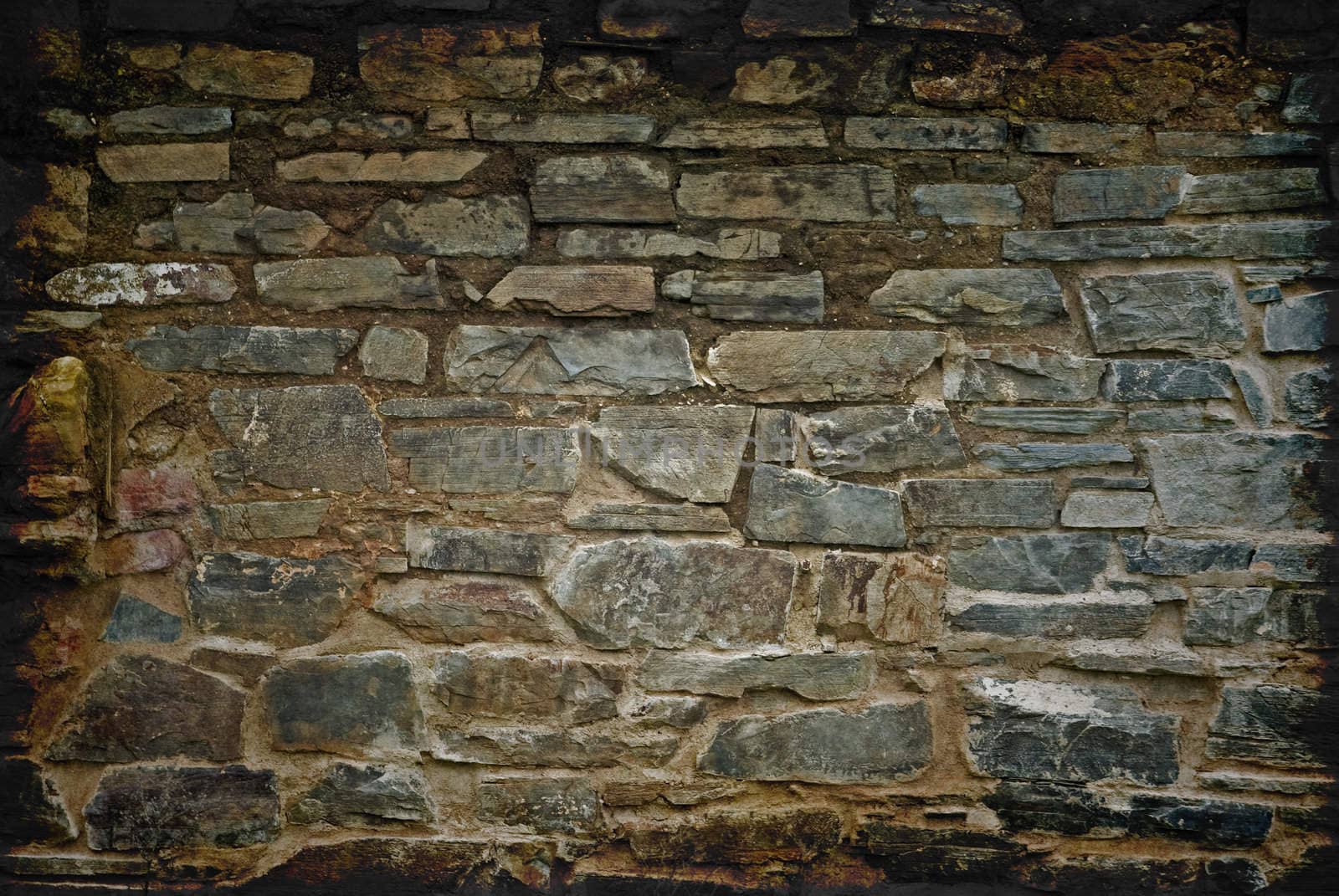 an old dirty and grungy stone wall background