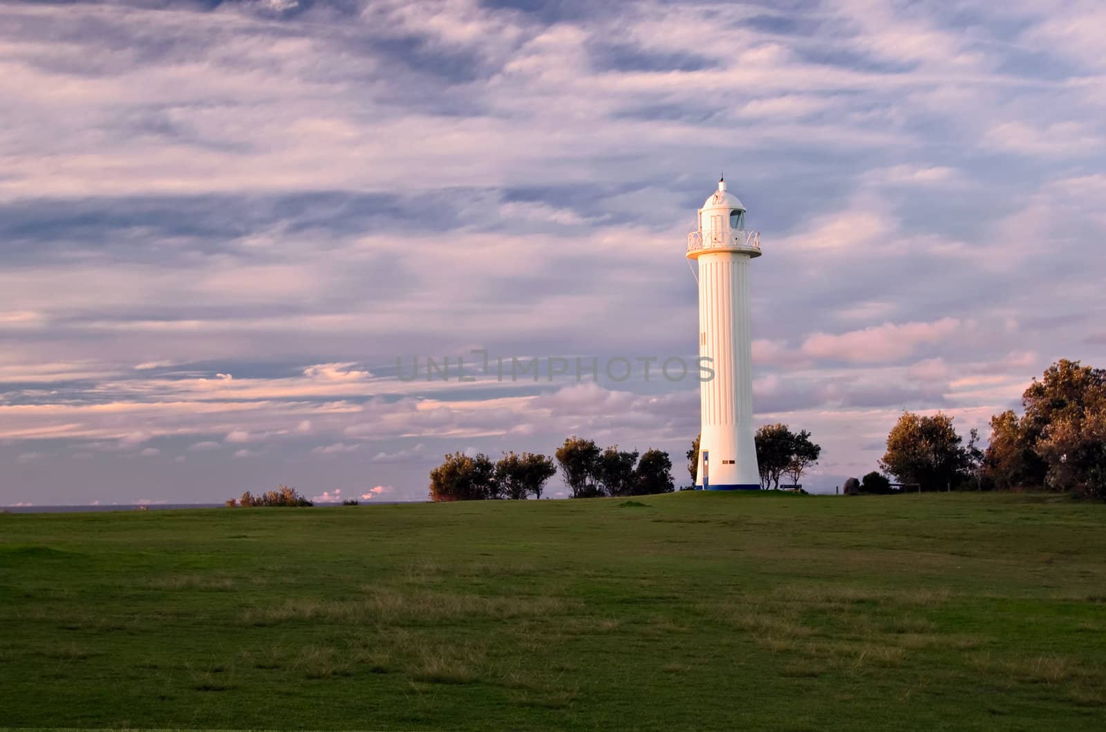 the lighthouse at yamba, nsw at sunset