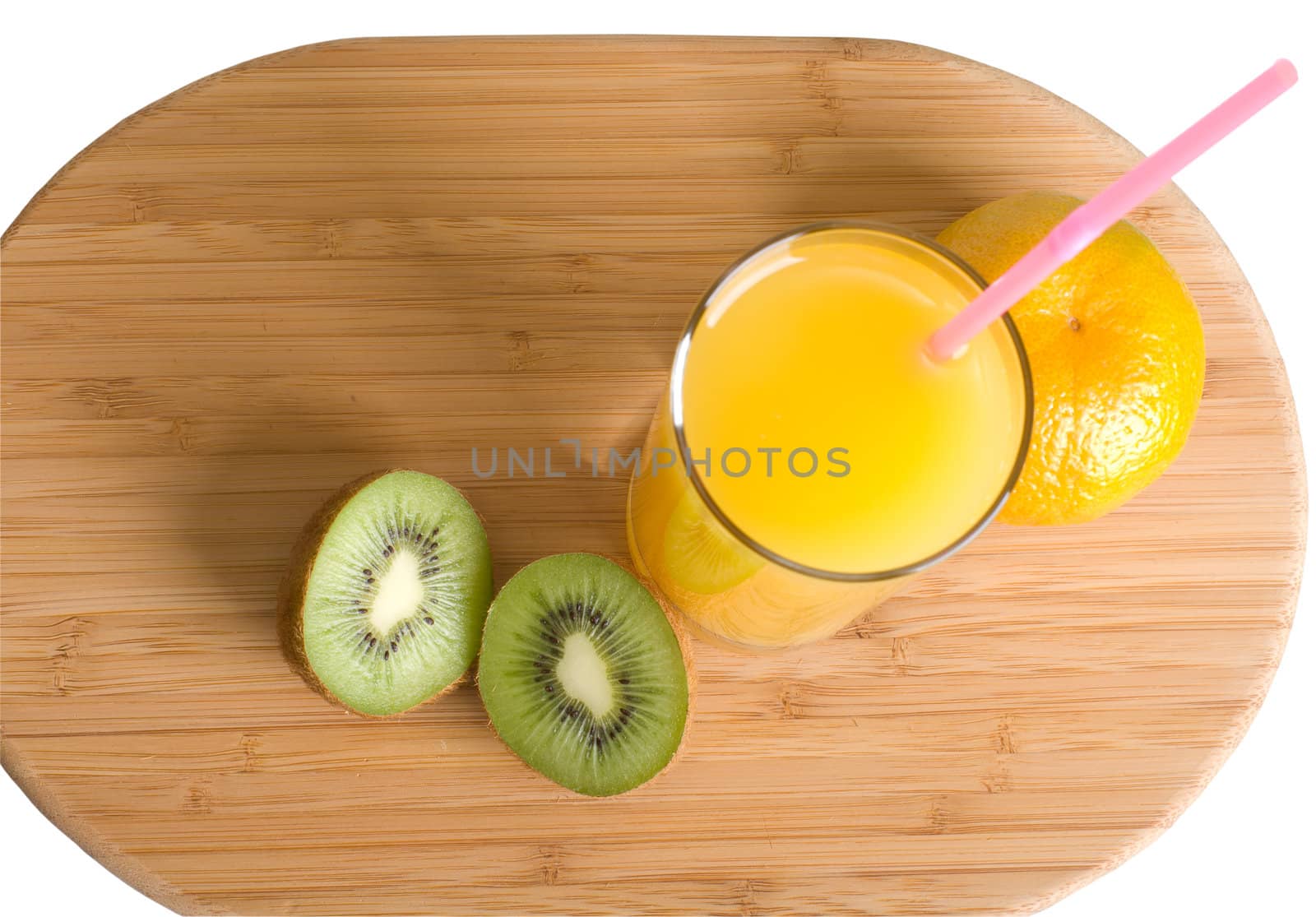 Fruit and juice glass on a board the top view.