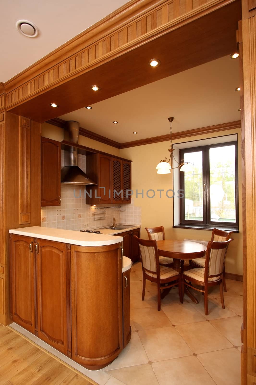 Kitchen with furniture from a natural tree
