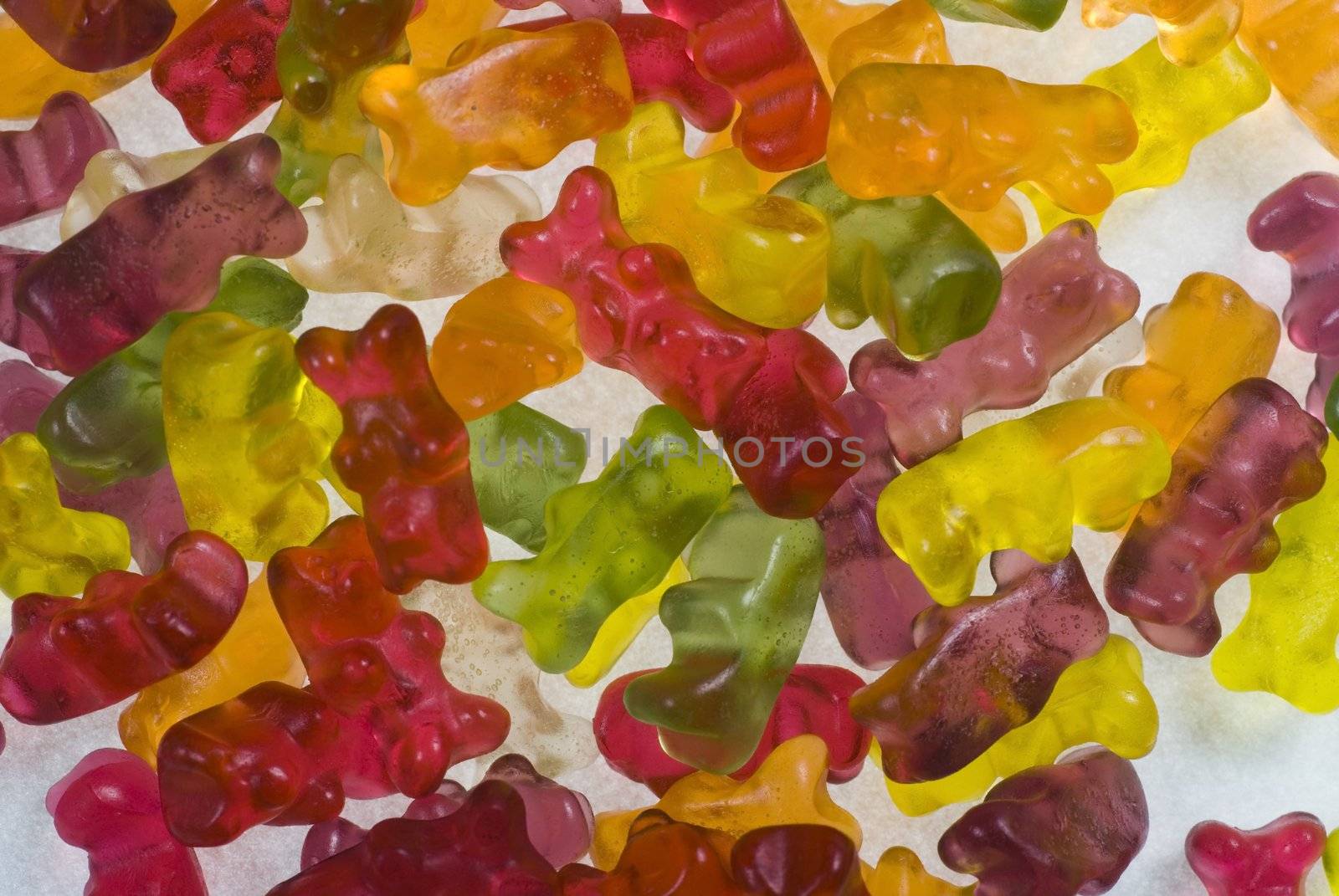 Coloured gummi-bears  on white background

