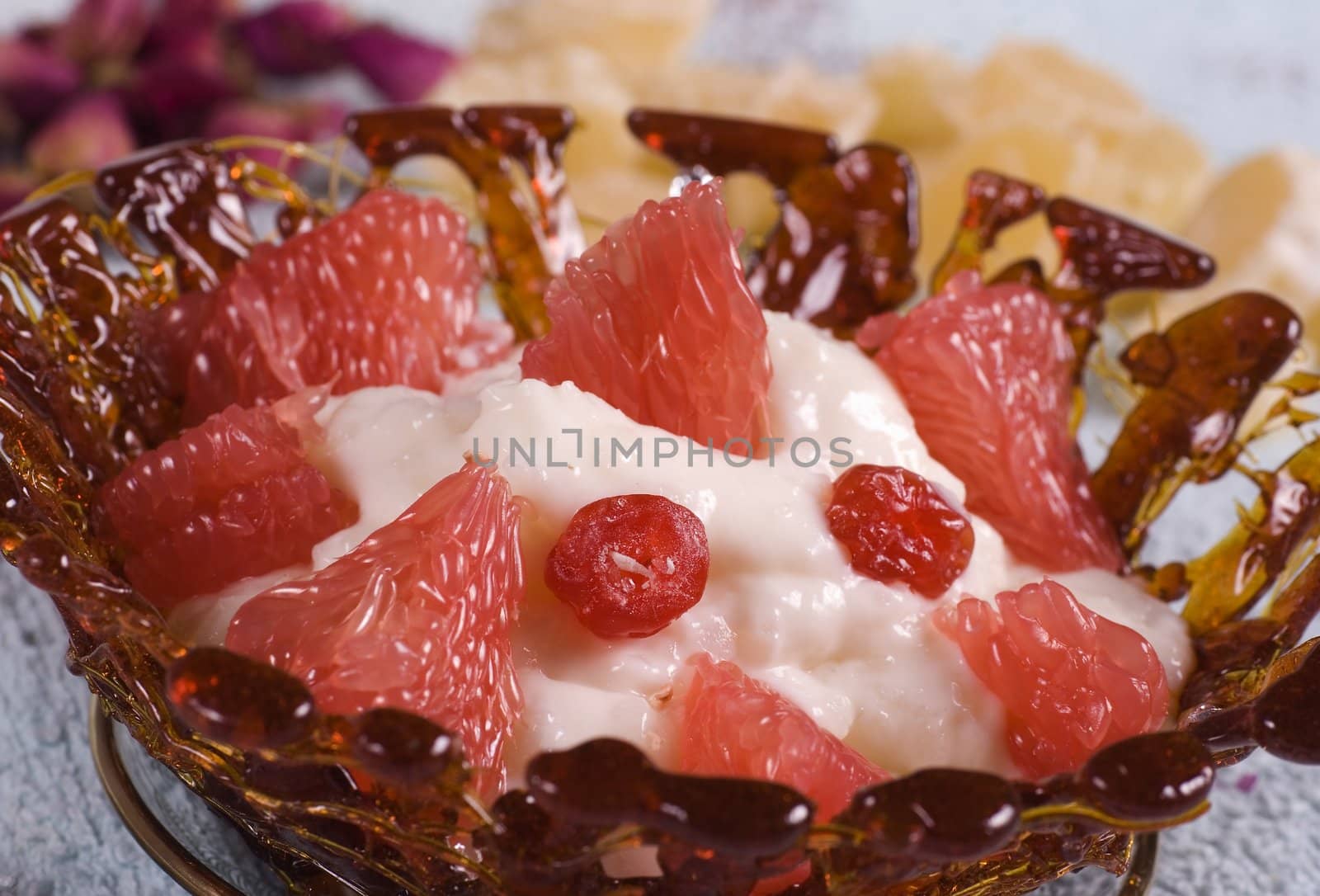 Caramel vase with raspberries with ice cream