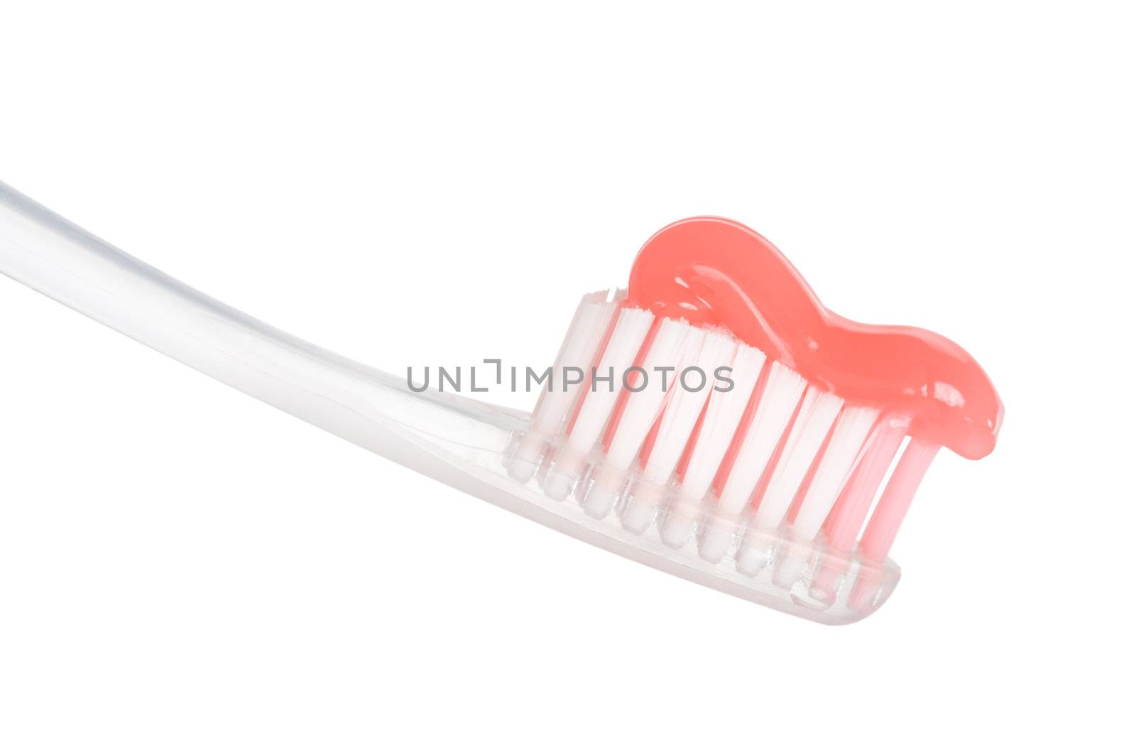tooth-brush with red paste, isolated on white