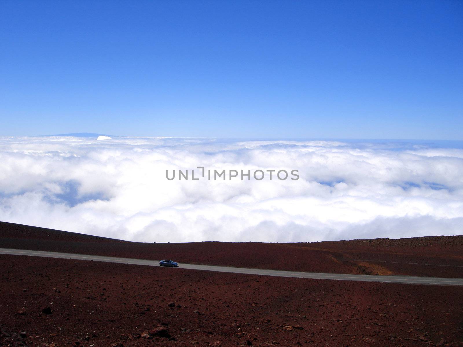 Car driving down from Haleakala Crater, Maui, Hawaii