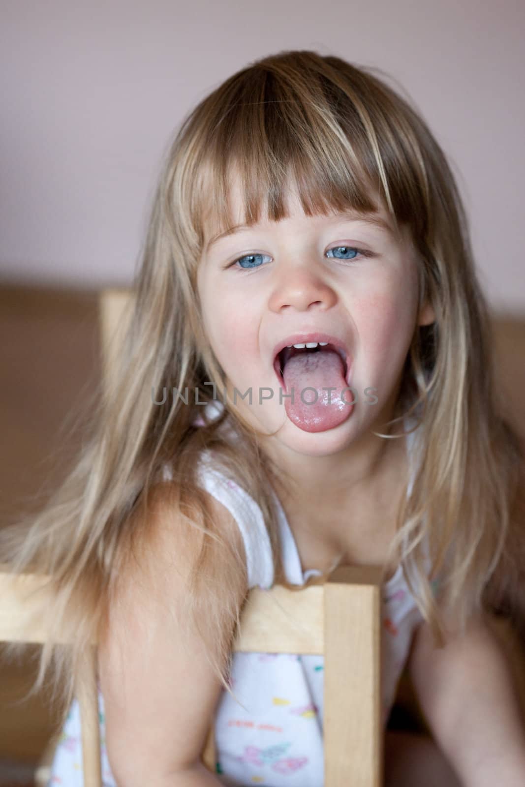 people series: little girl put out one's tongue