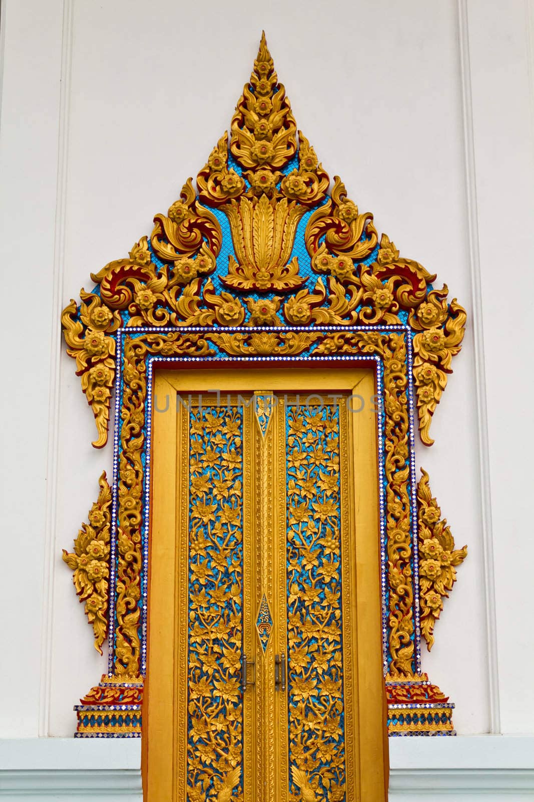 Traditional Thai style on door in temple Thailand