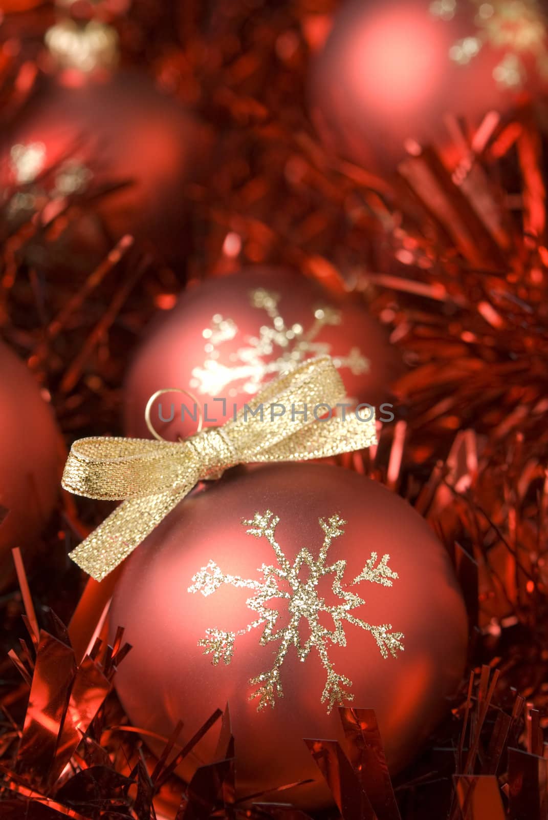 Red christmas ball on the tinsel. aRGB.