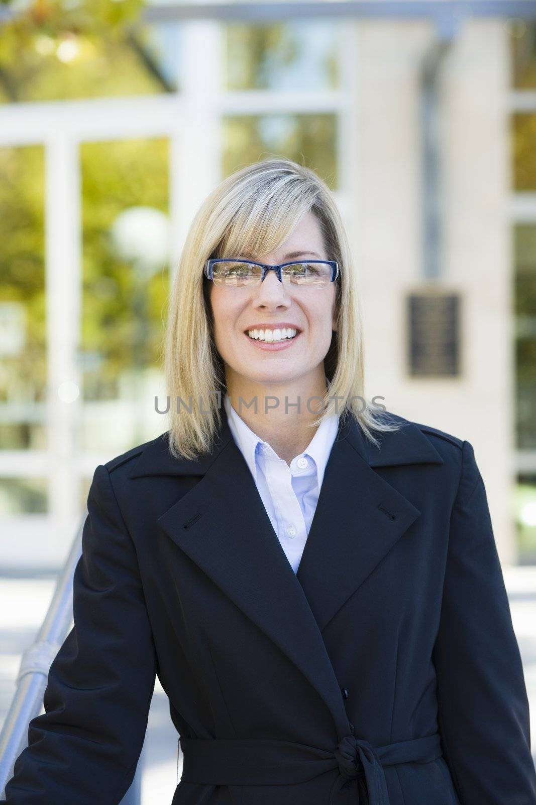 Portrait of a Pretty Blond Businesswoman Outdoors