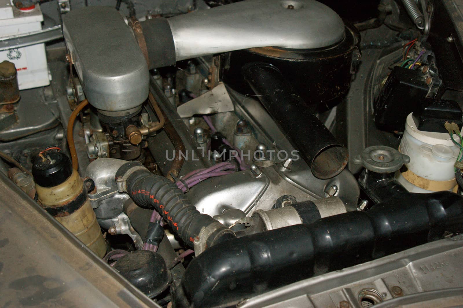 a close up under bonnet shot of a classic british vehicle