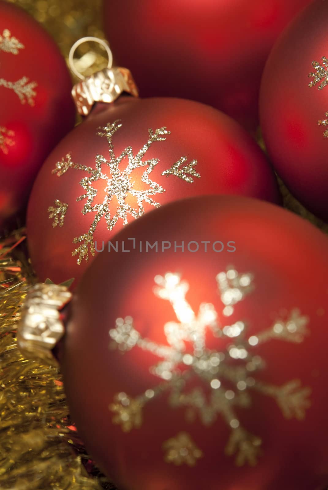 Decorative christmas balls on the gold tinsel. aRGB.
