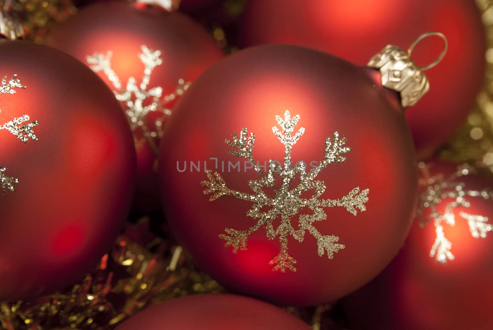 Decorative christmas balls on the gold tinsel. aRGB.