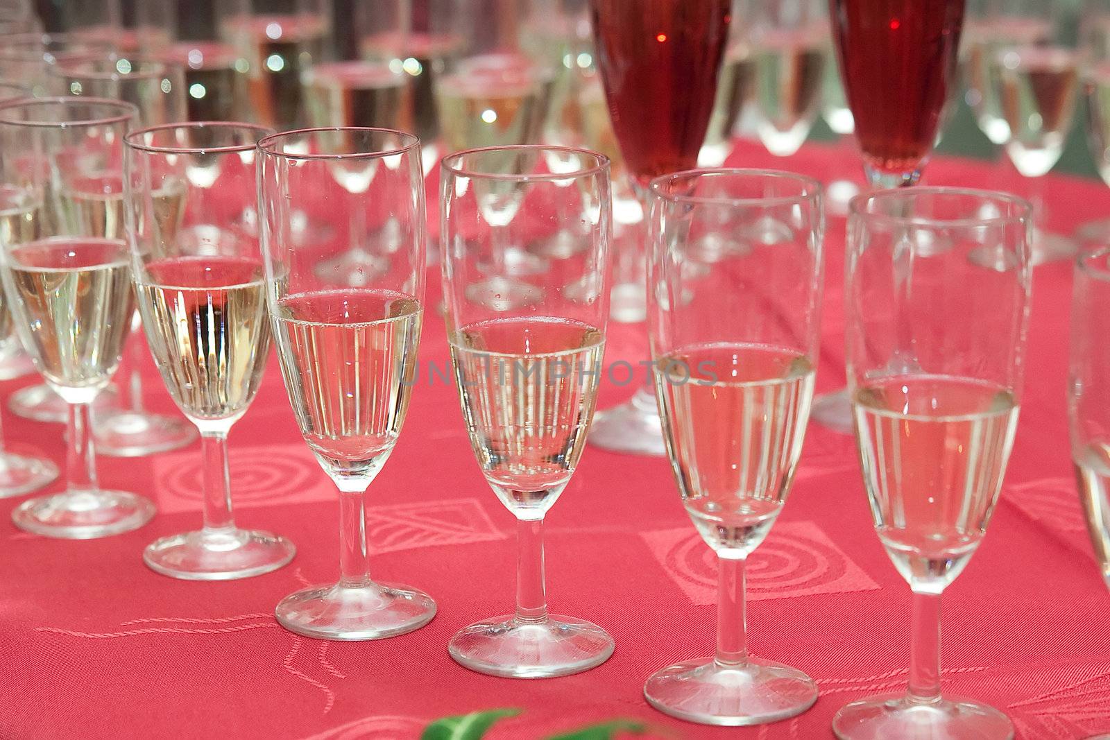 champaign glasses on wedding party - photo with small DOF