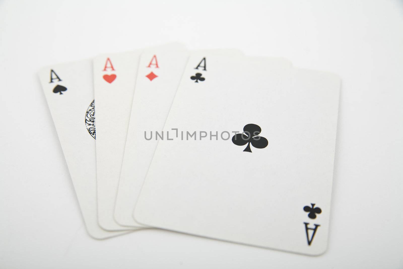 four aces - playing cards on light background