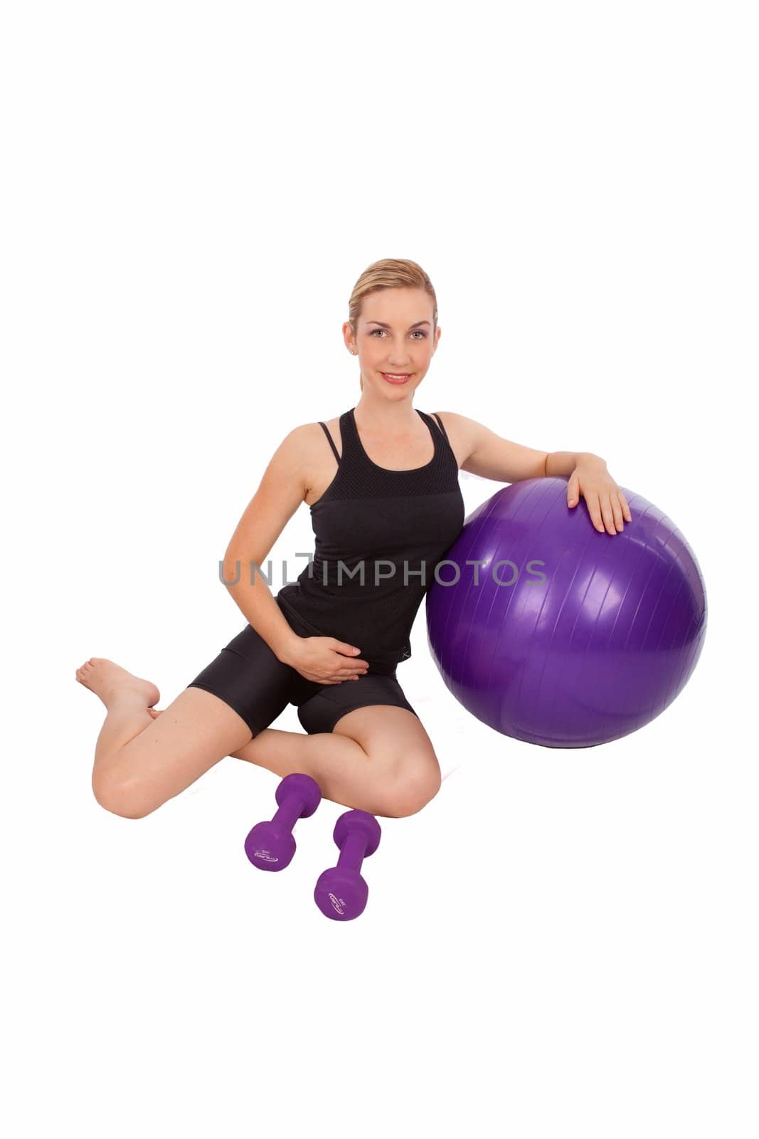 Young woman with fitness equipment isolated on white