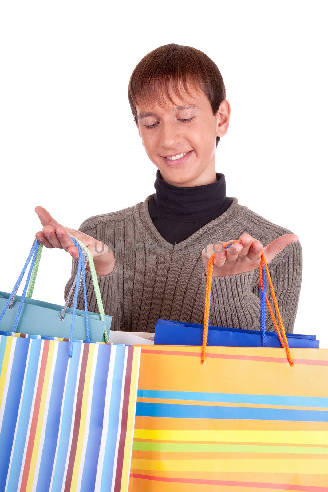 young man  handing gift bags on white background