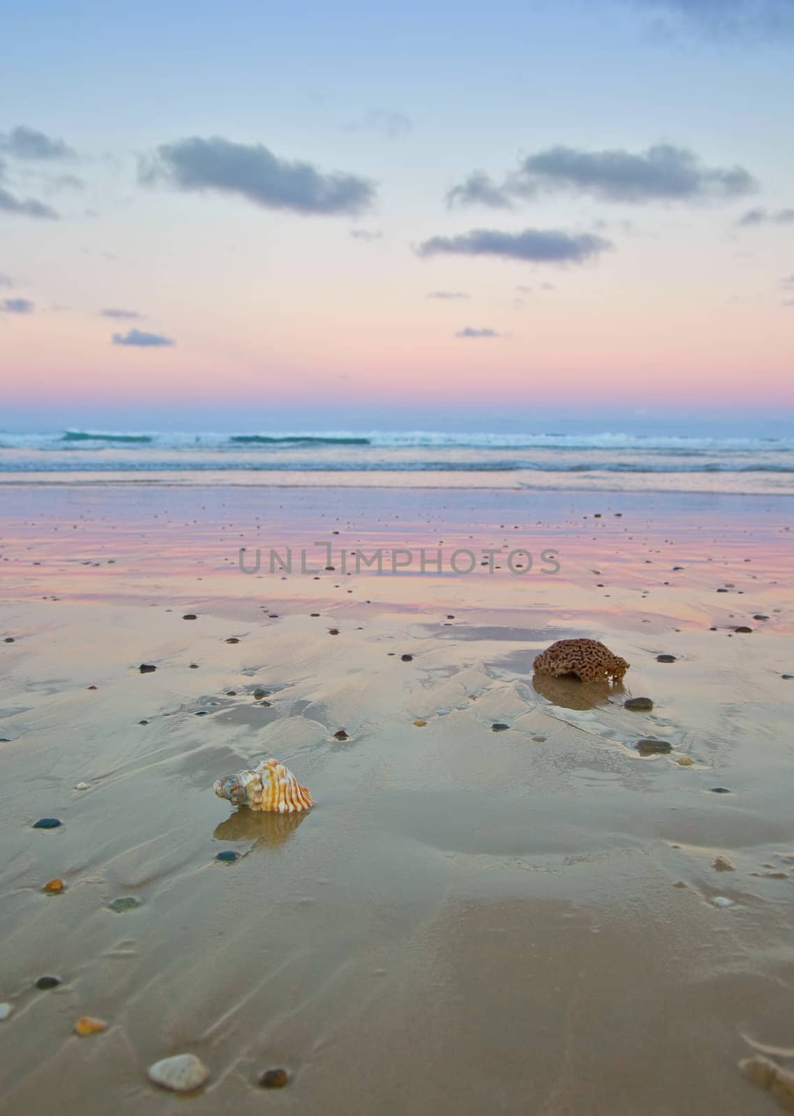 beautiful beach at sunset slow shutter for smooth water