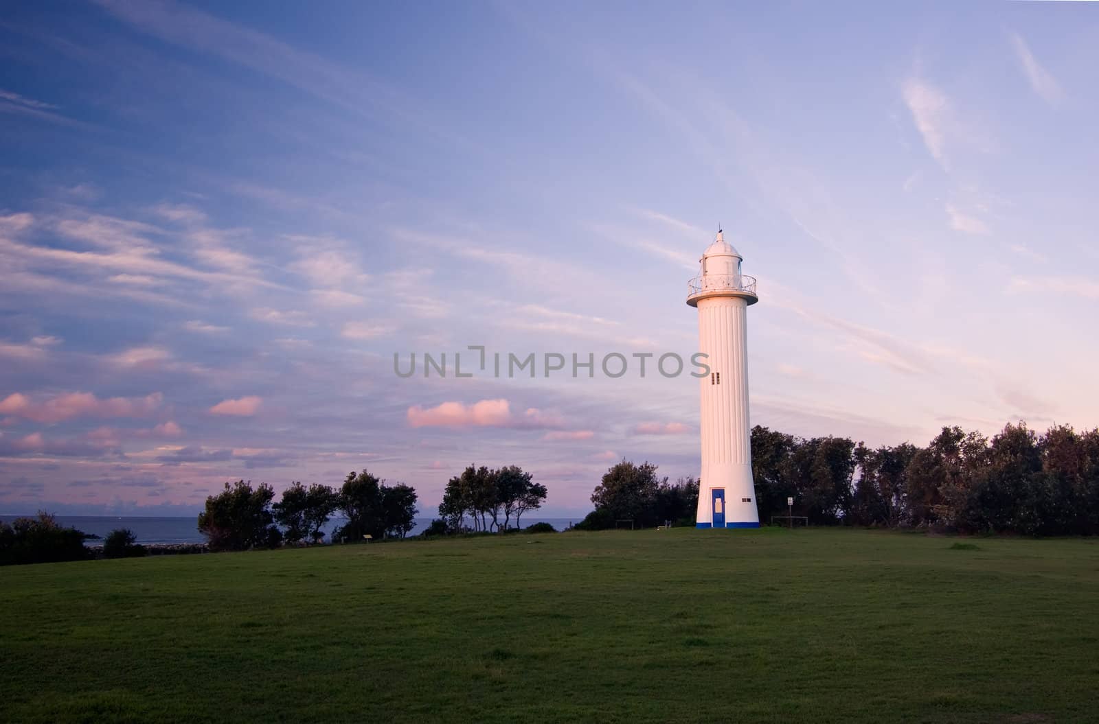 the lighthouse at yamba, nsw at sunset